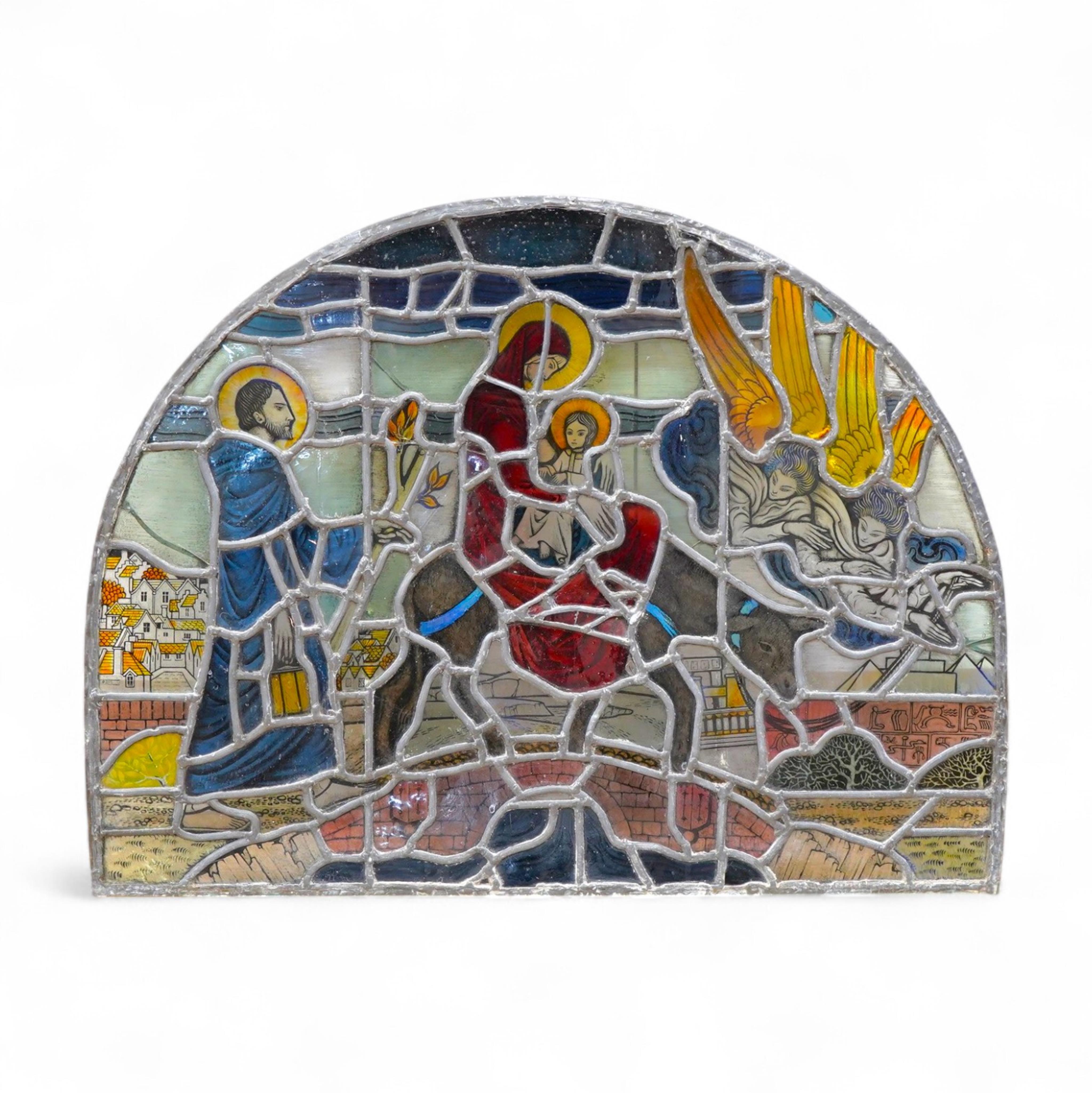 A 20th century semi circular stained glass panel, approximately 80cm wide